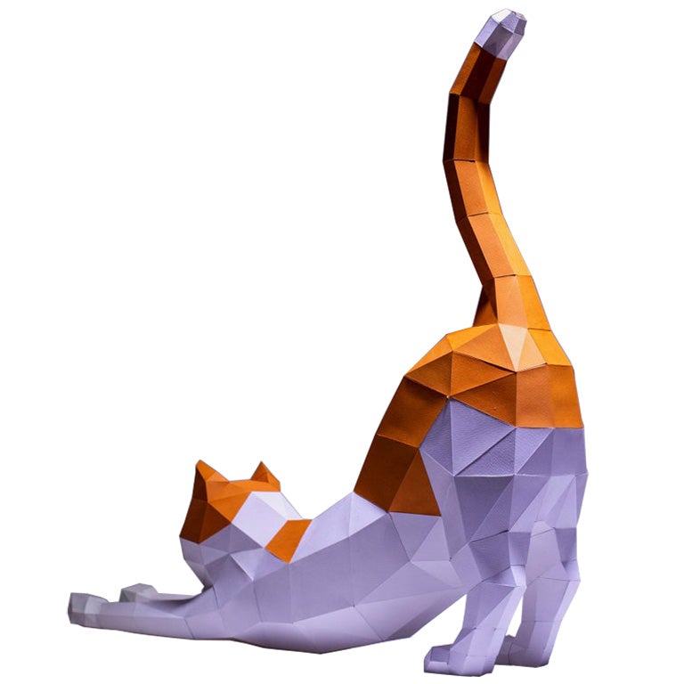 A colorful 3D paper model of a stretching cat, showcasing its playful pose and intricate design, made from recycled materials.