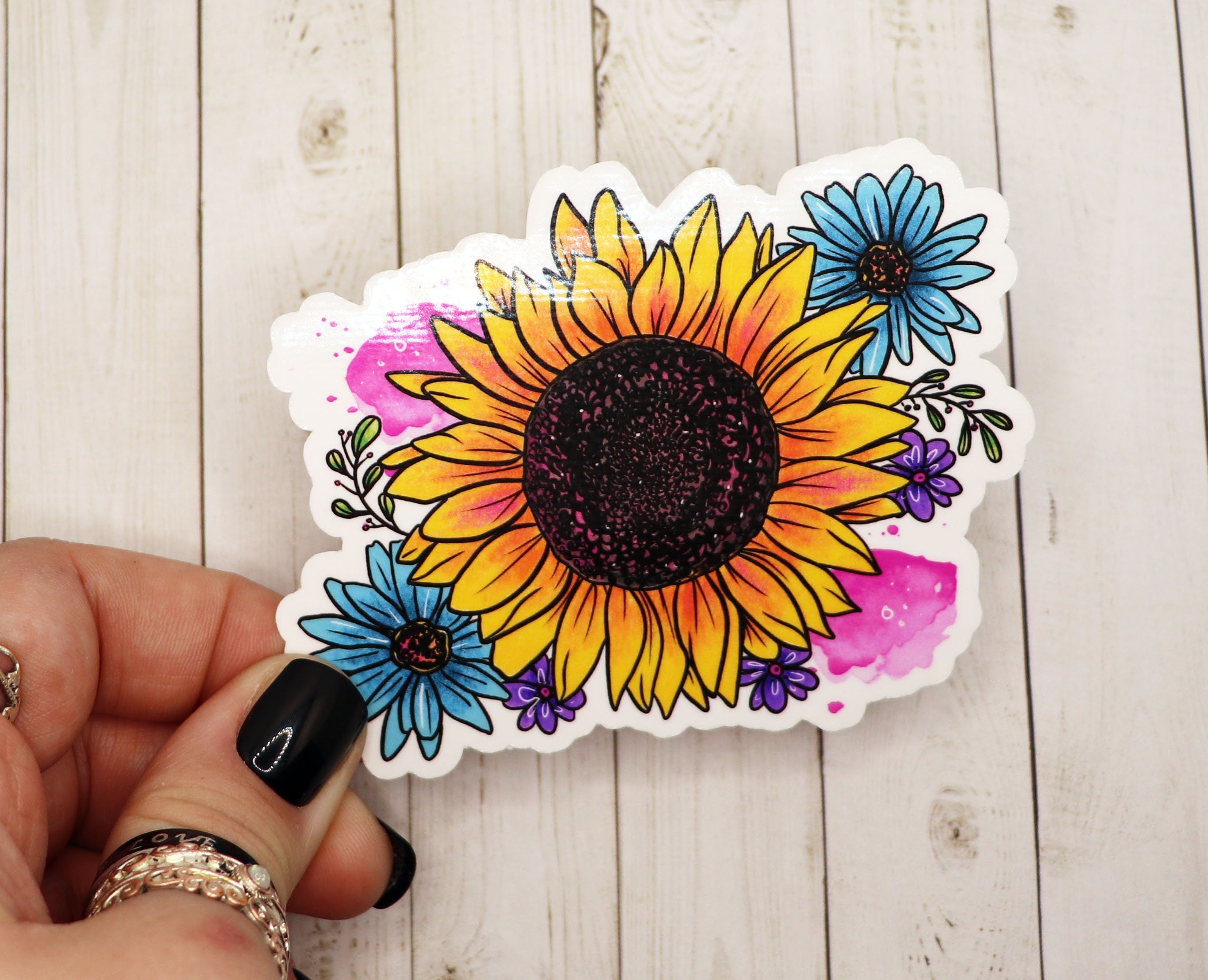 A vibrant sunflower botanical illustration sticker on a white background, showcasing intricate details and a matte finish.