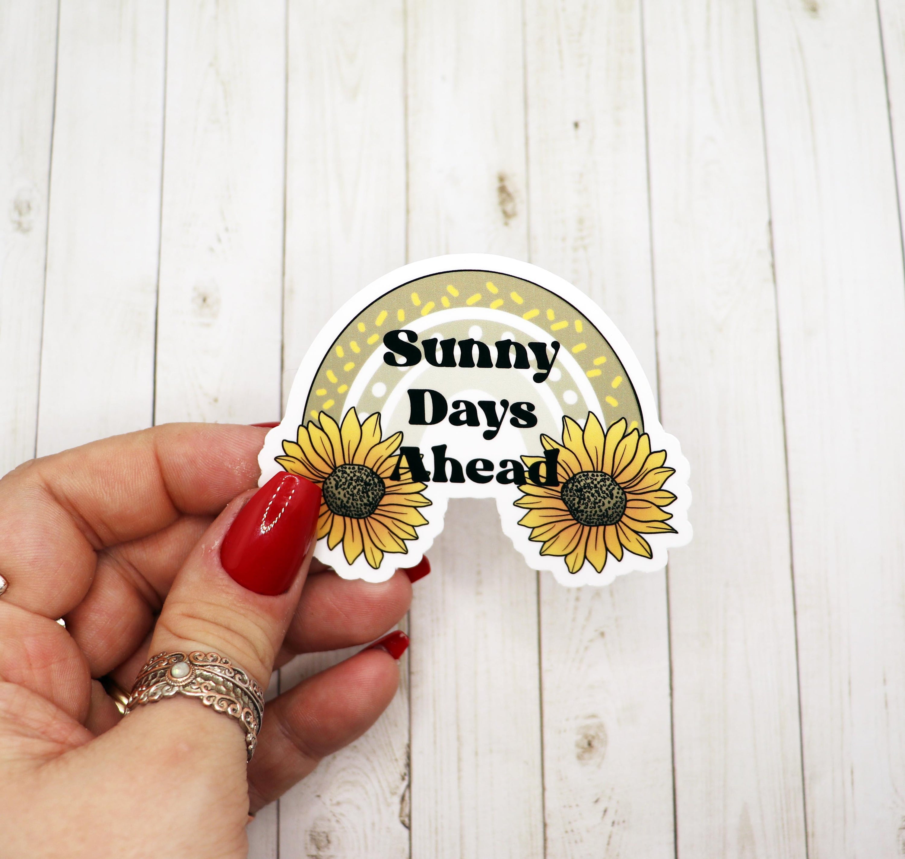 Sunny Days Ahead Vinyl Sticker featuring a bright and cheerful design, perfect for personalizing various items.