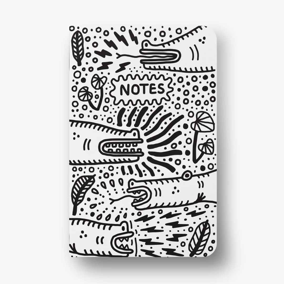 Swamp Outlines Softcover Classic Layflat Notebook featuring swamp creatures illustration by Erwin Ong, showcasing a water-resistant cover and dot grid pages.