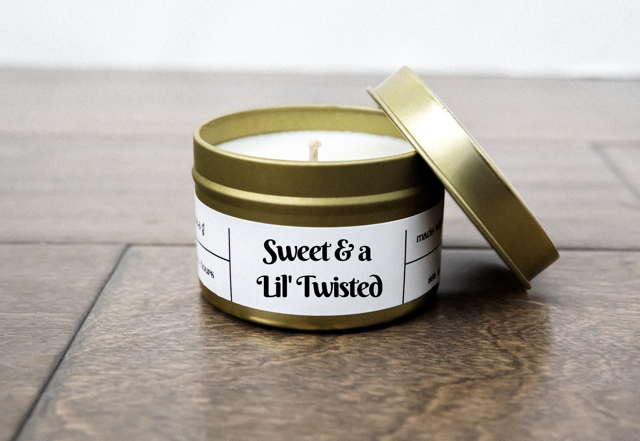 Sweet & a Lil' Twisted candle in a 4oz jar with mint candy cane fragrance, showcasing its eco-friendly design and quality craftsmanship.