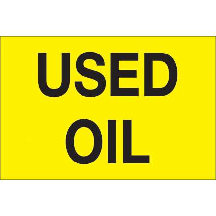 "Used Oil" sign on yellow background.