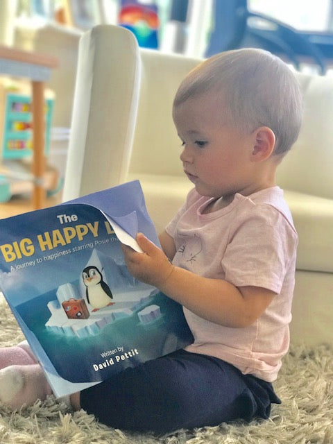 Cover of 'The BIG Happy Life' featuring Posie the Penguin on a colorful adventure, symbolizing self-discovery and happiness.