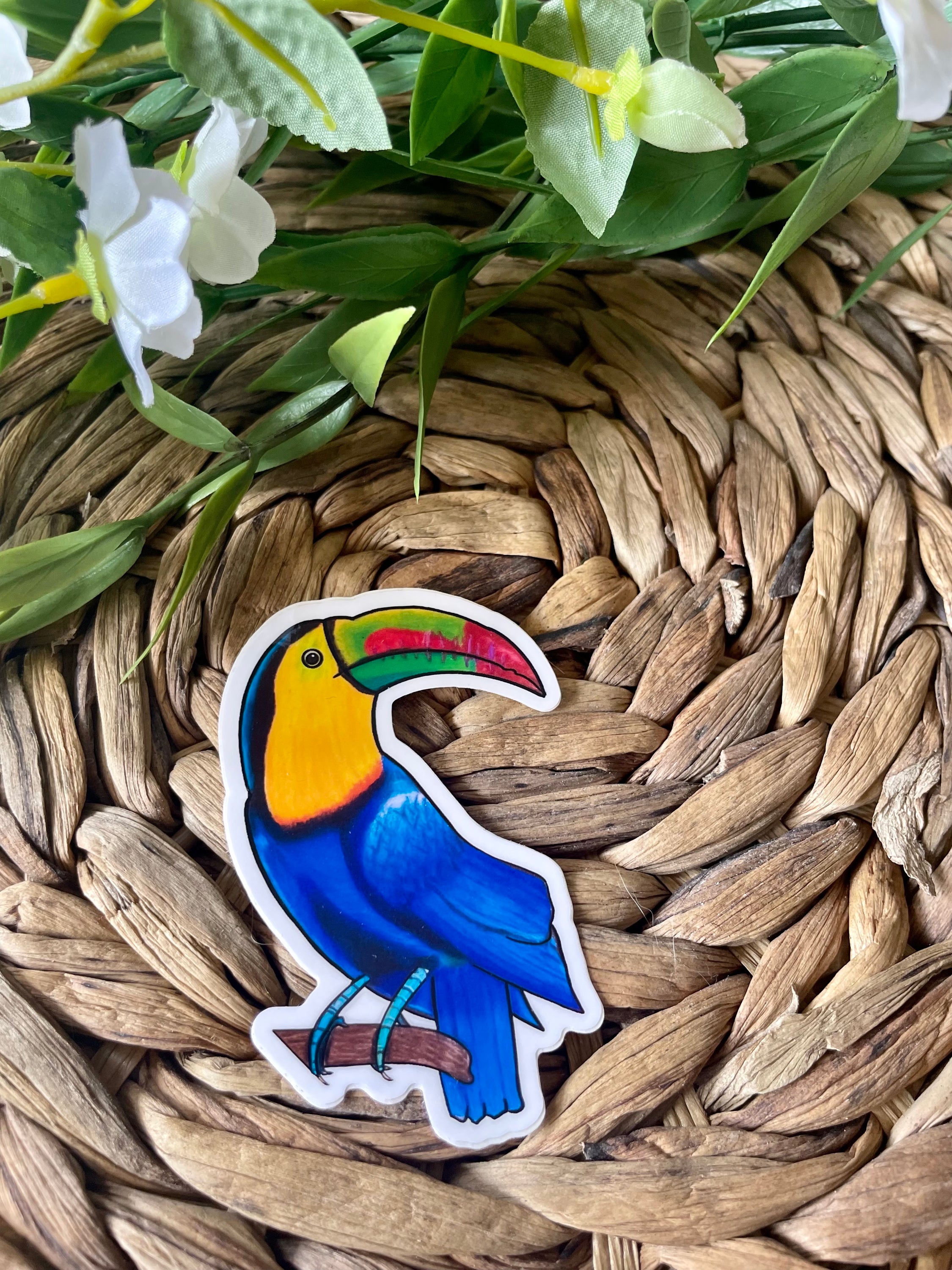 A colorful toucan sticker featuring a cute toucan design, perfect for personalizing items like laptops and water bottles.