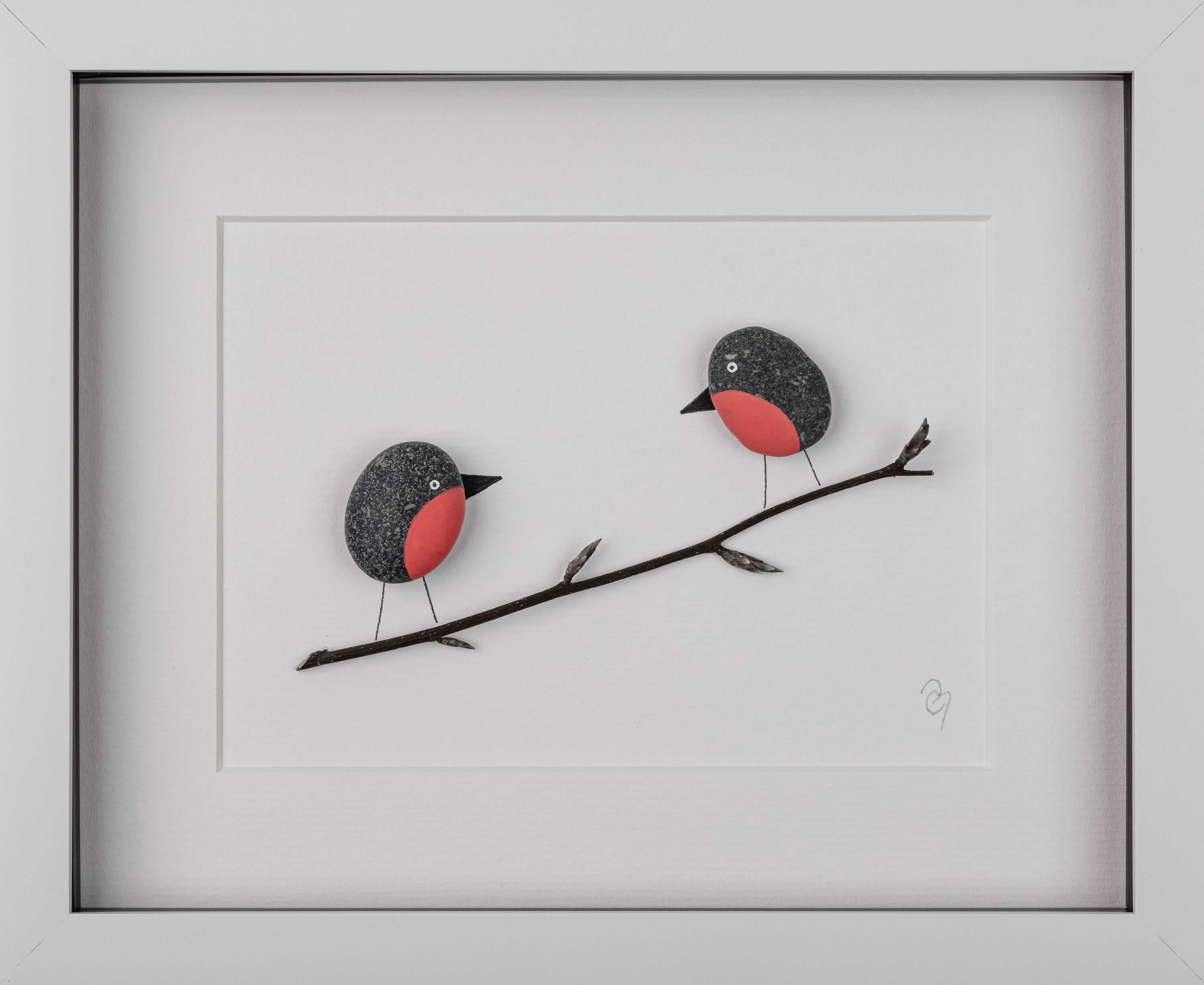 A beautifully framed artwork featuring two little robins, showcasing their vibrant colors and intricate details, perfect for nature lovers.