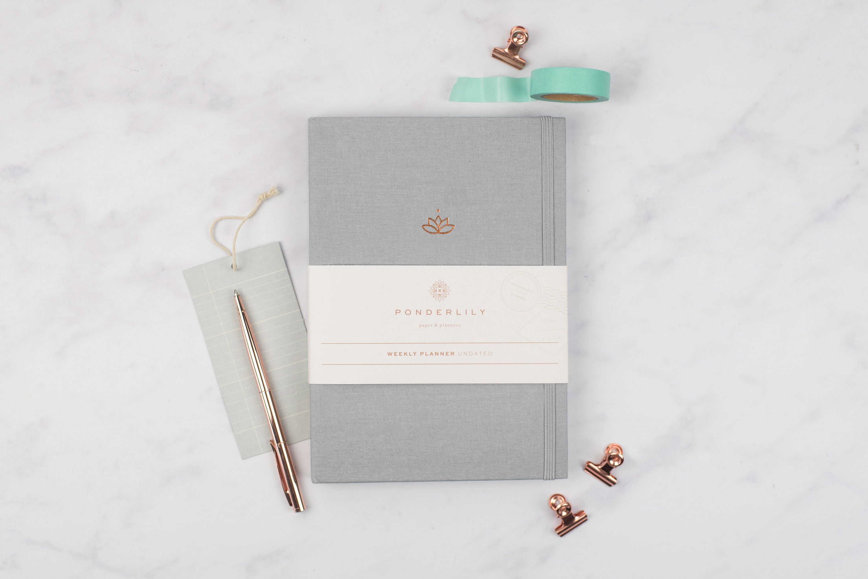 Undated Weekly Ponderlily Planner in Grey, featuring elegant design and eco-conscious materials, perfect for flexible planning.