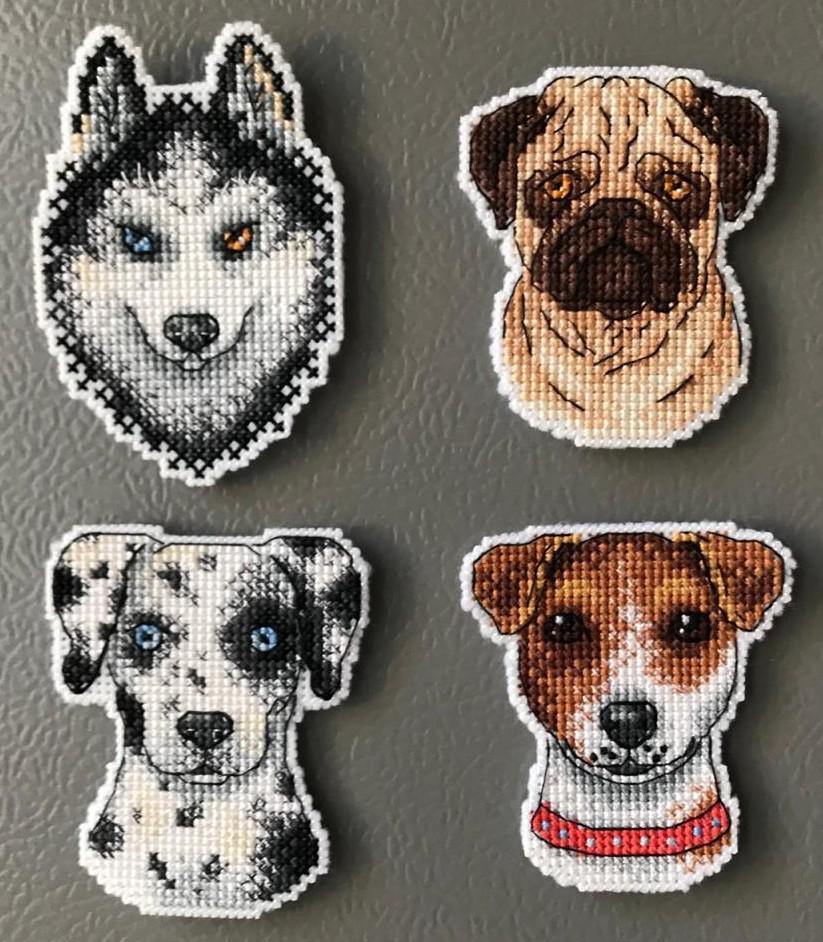 Who Said Woof? Magnets SR-409 Cross Stitch Kit featuring colorful threads, plastic canvas, and finished dog-themed magnets.