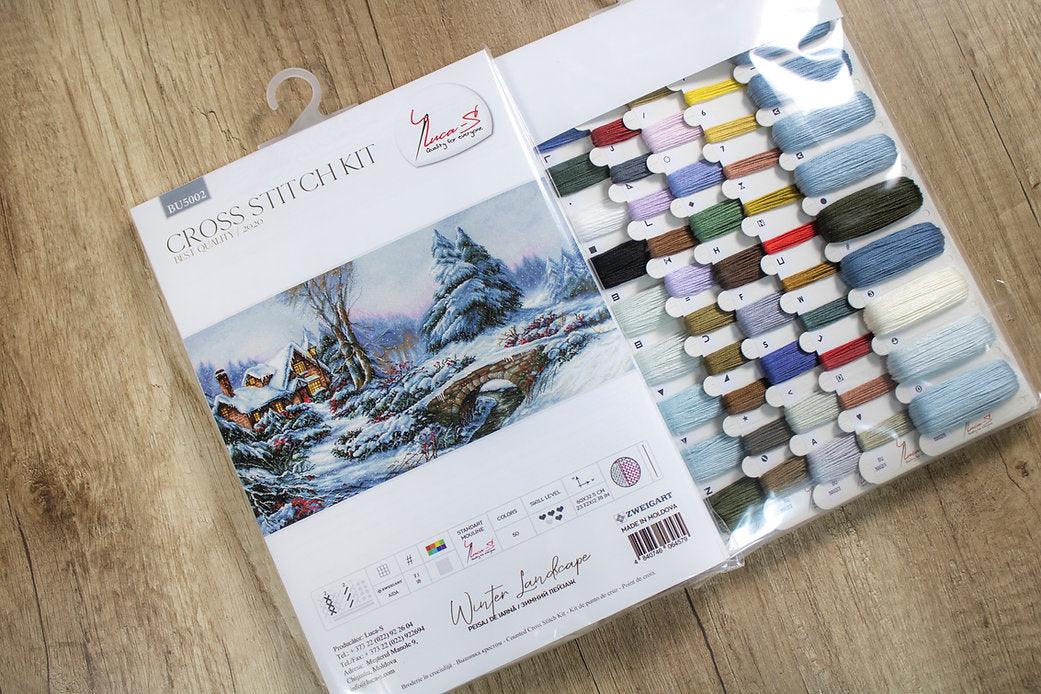 Winter Landscape BU5002L Counted Cross-Stitch Kit featuring Aida canvas, vibrant threads, and a serene snowy scene design.