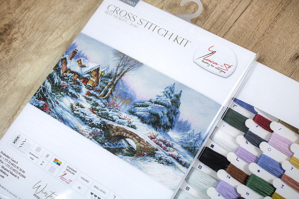 Winter Landscape BU5002L Counted Cross-Stitch Kit featuring Aida canvas, vibrant threads, and a serene snowy scene design.