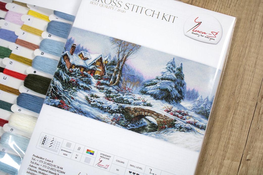 Winter Landscape BU5002L Counted Cross-Stitch Kit featuring Aida canvas, vibrant threads, and a serene snowy scene design.