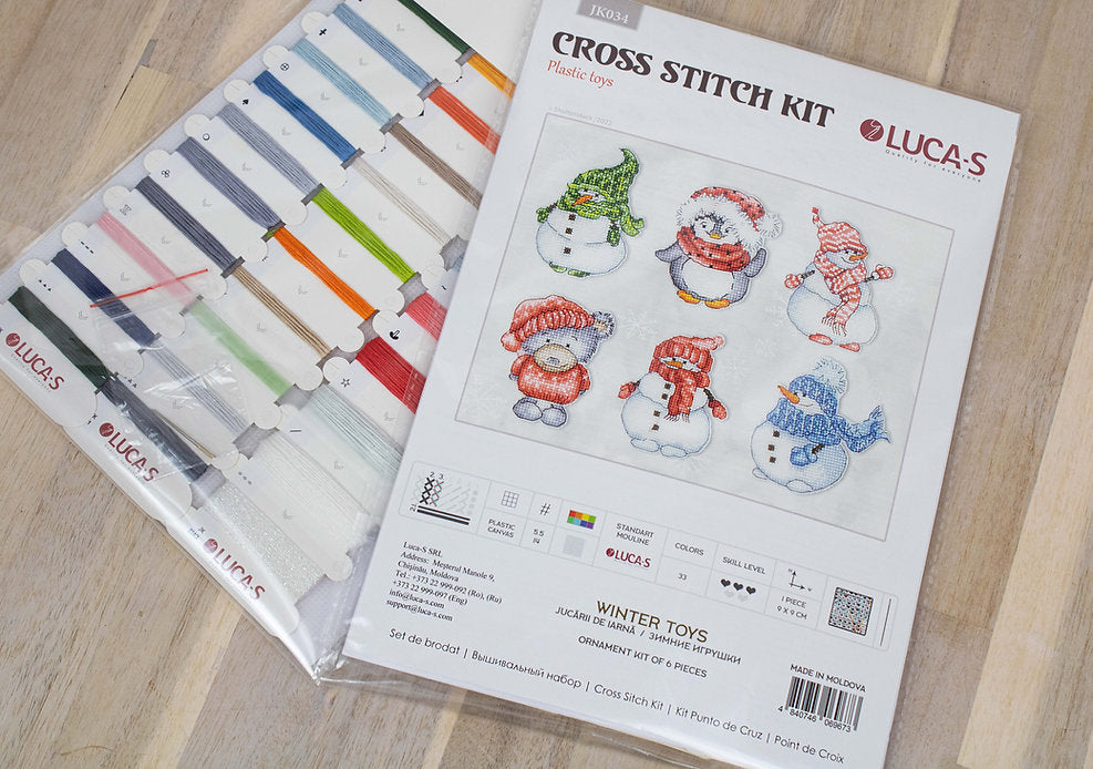 Winter Toys JK034L Counted Cross-Stitch Kit featuring Aida plastic canvas, 33 colors, needle, and instructions.