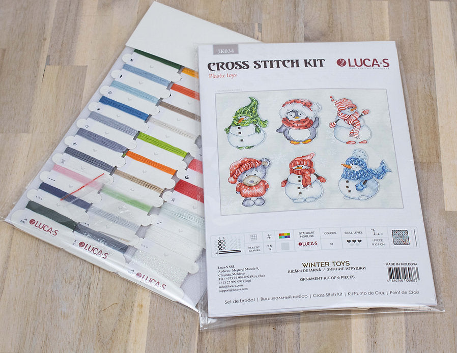 Winter Toys JK034L Counted Cross-Stitch Kit featuring Aida plastic canvas, 33 colors, needle, and instructions.