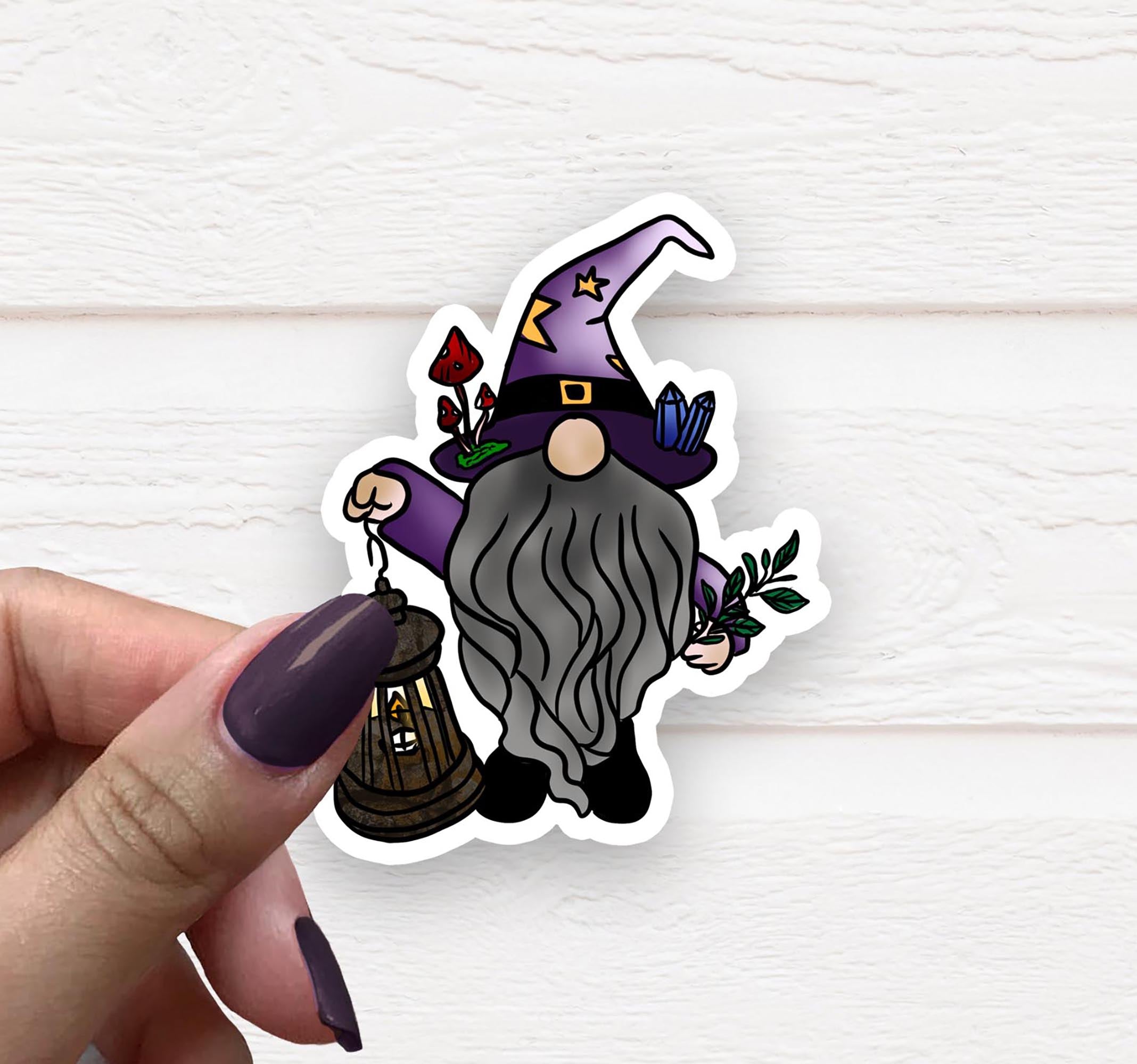 A whimsical Witch Gnome Sticker featuring a charming gnome design, perfect for personalizing various items.