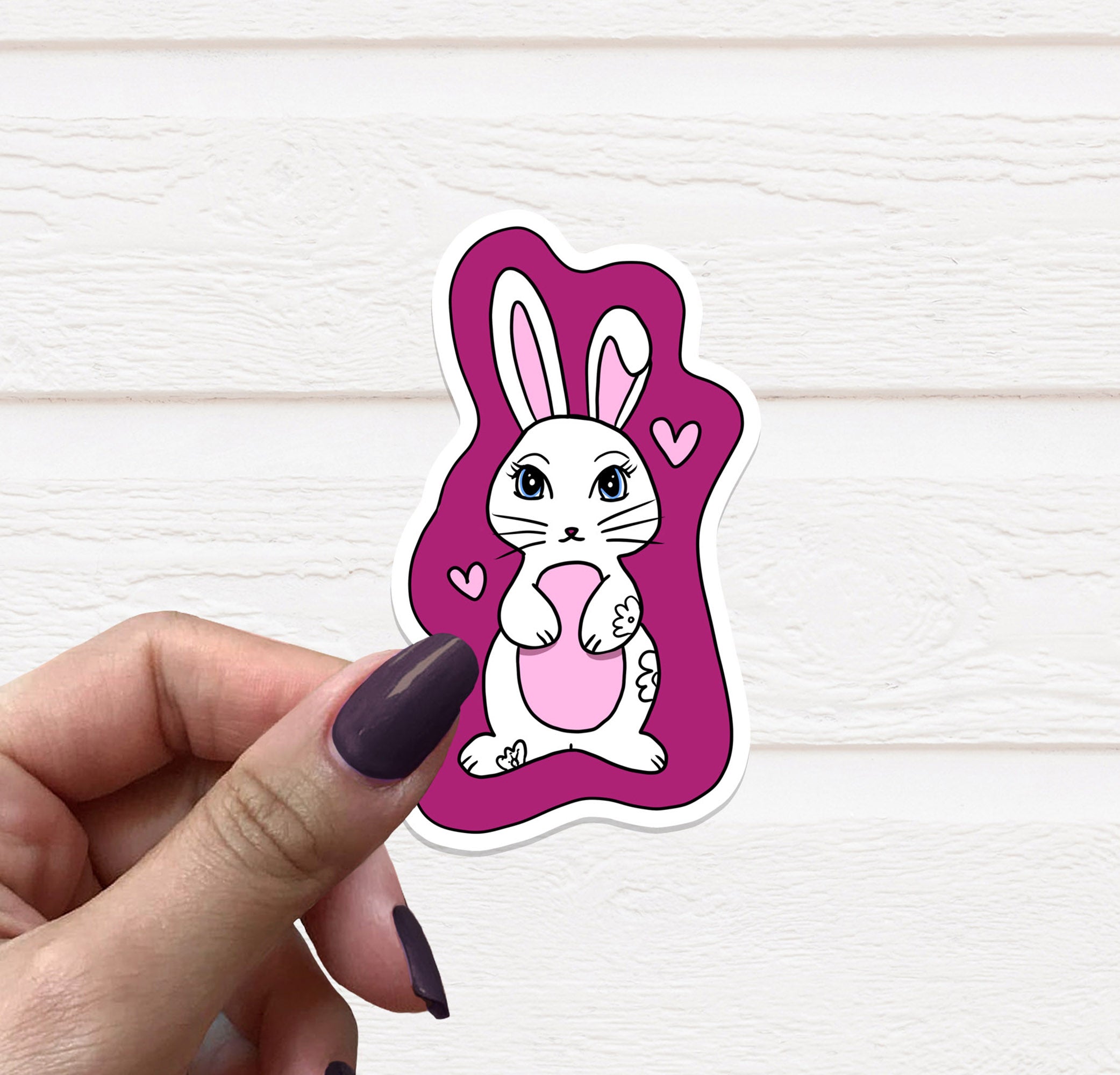 A vibrant Year of the Rabbit vinyl sticker, measuring 3.5 inches, featuring a colorful rabbit design on a matte finish.