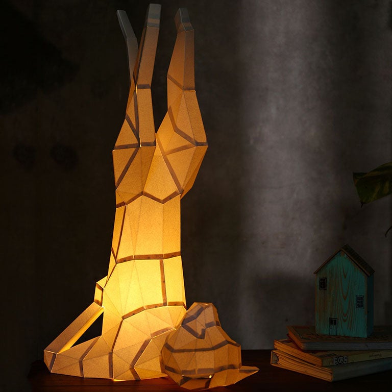 A beautifully crafted Yoga Cat 3D Paper Model lamp in a yoga pose, showcasing intricate paper art design.