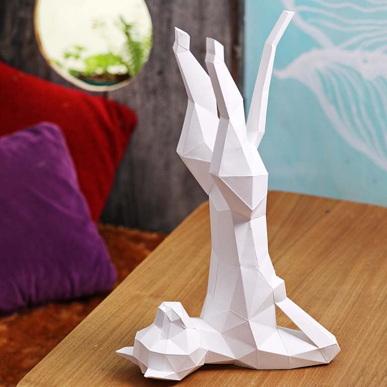 A beautifully crafted Yoga Cat 3D Paper Model lamp in a yoga pose, showcasing intricate paper art design.