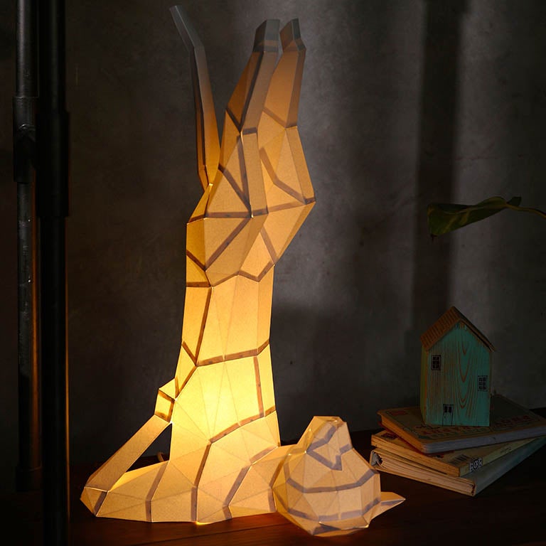 A beautifully crafted Yoga Cat 3D Paper Model lamp in a yoga pose, showcasing intricate paper art design.