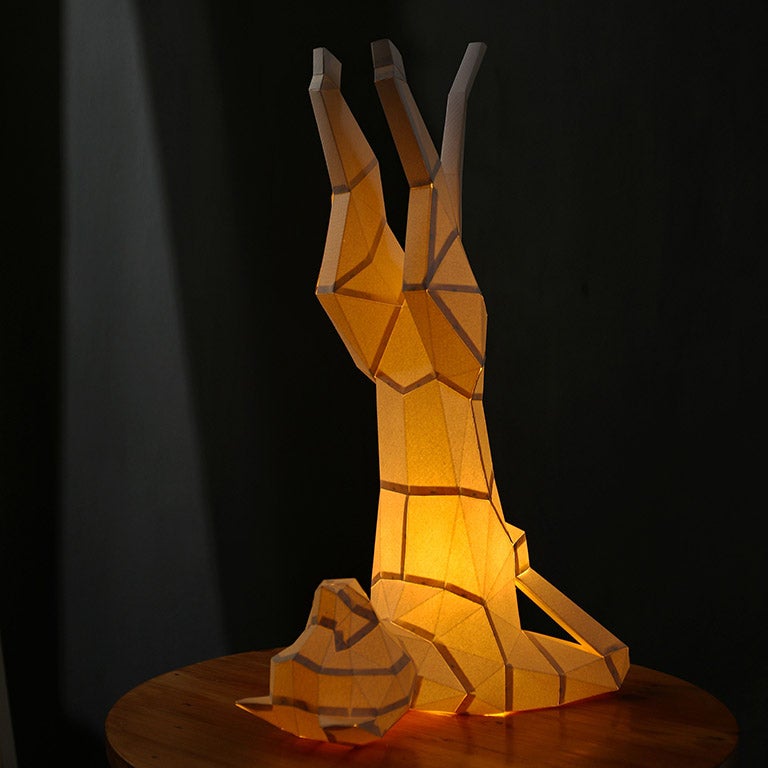 A beautifully crafted Yoga Cat 3D Paper Model lamp in a yoga pose, showcasing intricate paper art design.