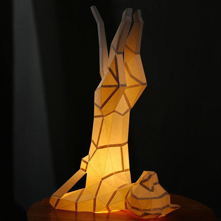 A beautifully crafted Yoga Cat 3D Paper Model lamp in a yoga pose, showcasing intricate paper art design.