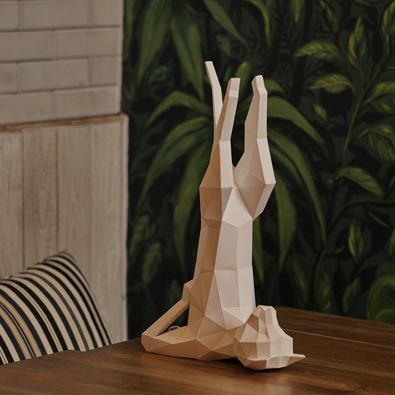 A beautifully crafted Yoga Cat 3D Paper Model lamp in a yoga pose, showcasing intricate paper art design.