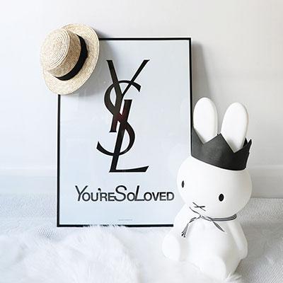 A beautifully designed print reading 'You're So Loved', perfect for nursery and children's room decor, showcasing vibrant colors and high-quality details.