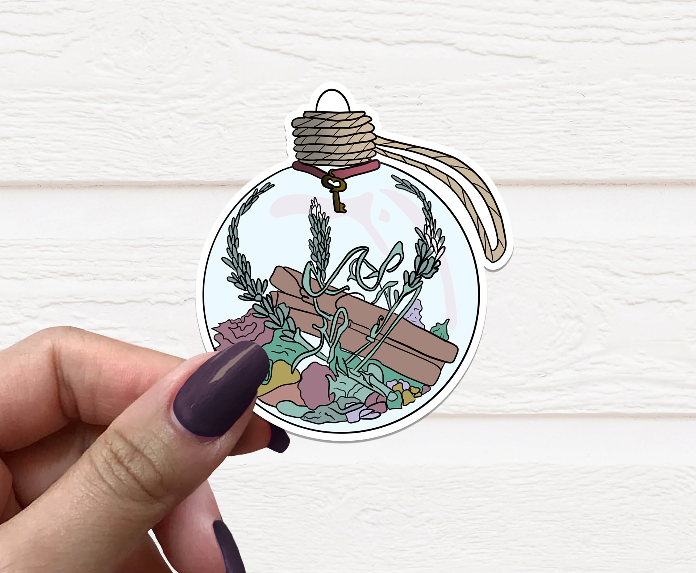 Yule Witchy Ball vinyl sticker featuring a festive design, perfect for holiday decorations and personalizing items.