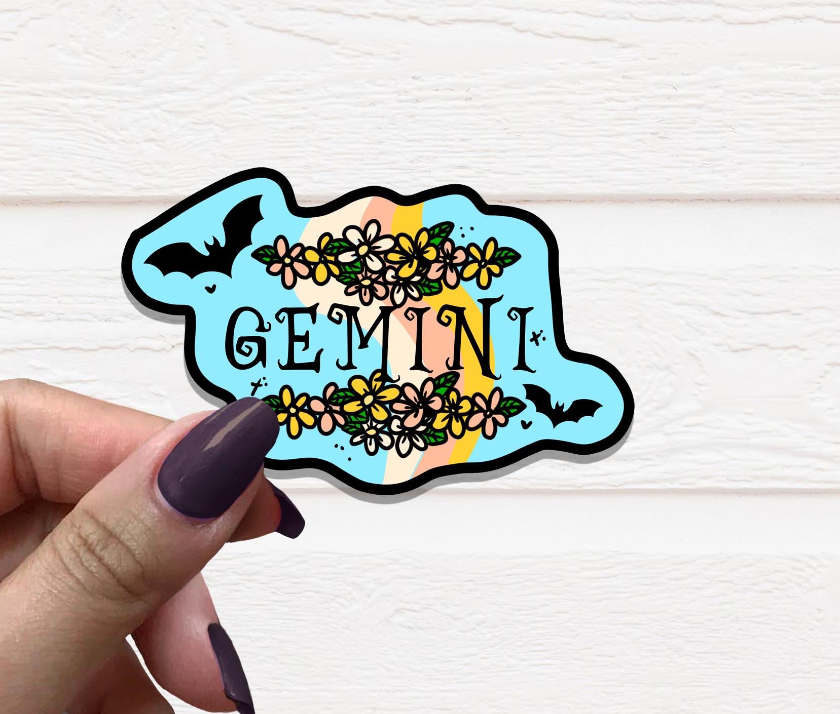 Zodiac Gemini Vinyl Sticker featuring a vibrant design on matte vinyl, perfect for personalizing various items.