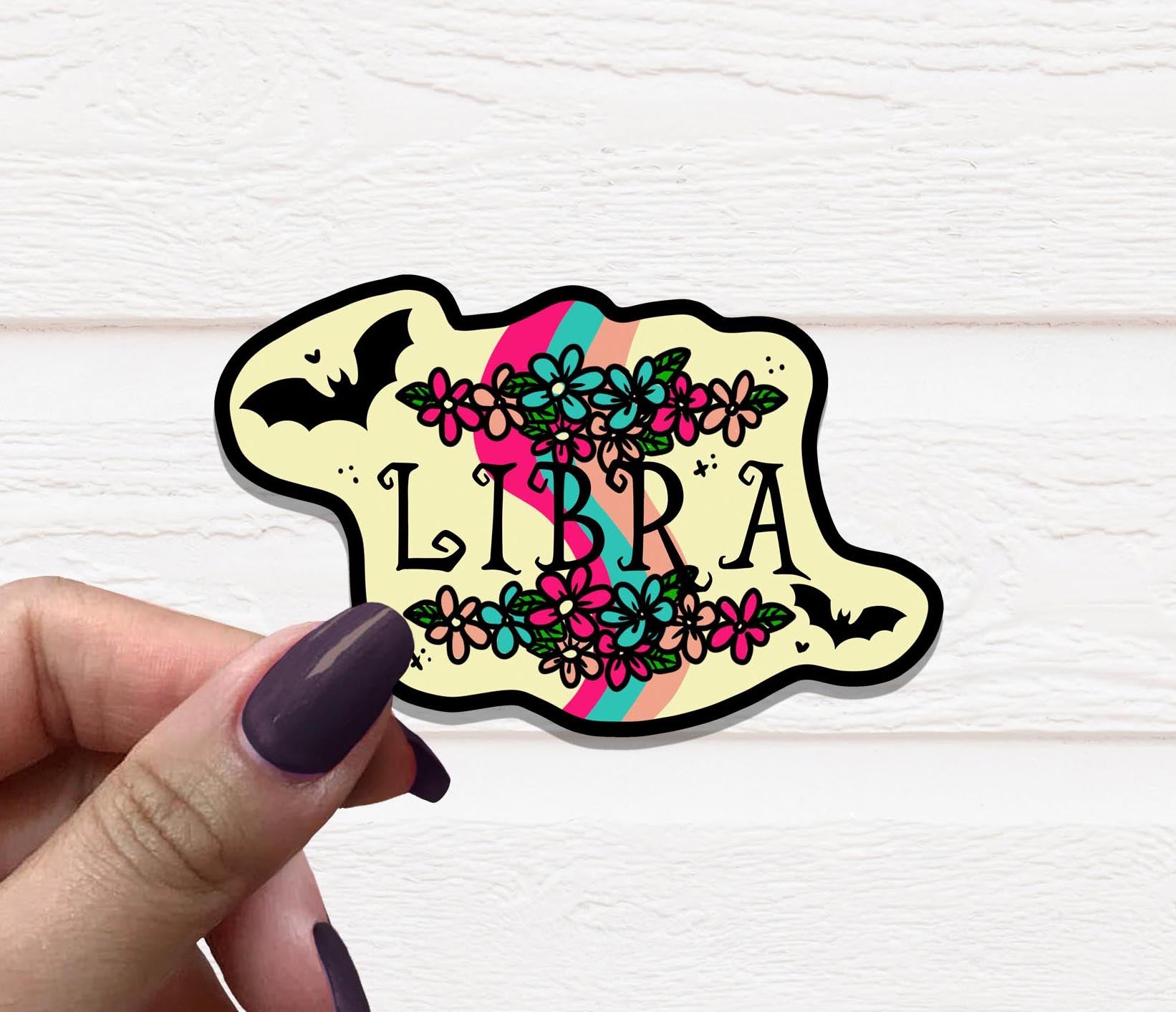 Zodiac Libra Vinyl Sticker featuring a stylish design, perfect for personalizing various items.