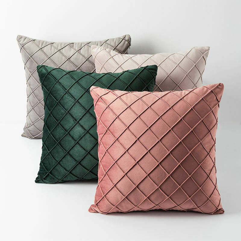 A set of 3D pattern velvet cushion covers in geometric design, measuring 43x43cm, showcasing a luxurious texture and vibrant colors.