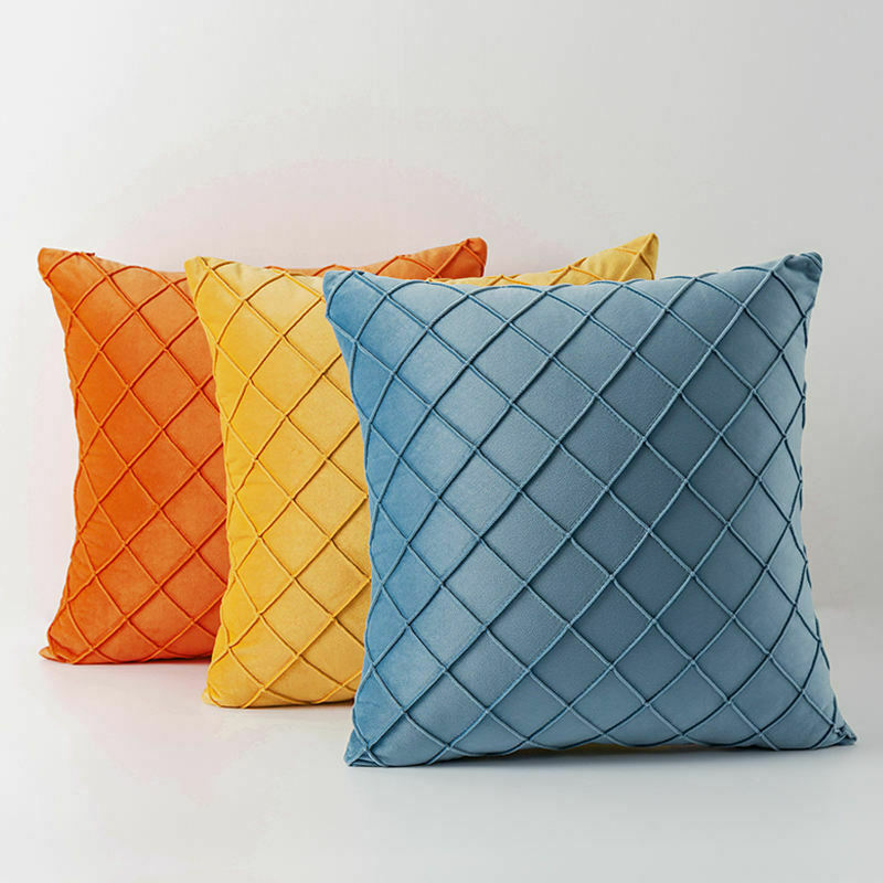 A set of 3D pattern velvet cushion covers in geometric design, measuring 43x43cm, showcasing a luxurious texture and vibrant colors.