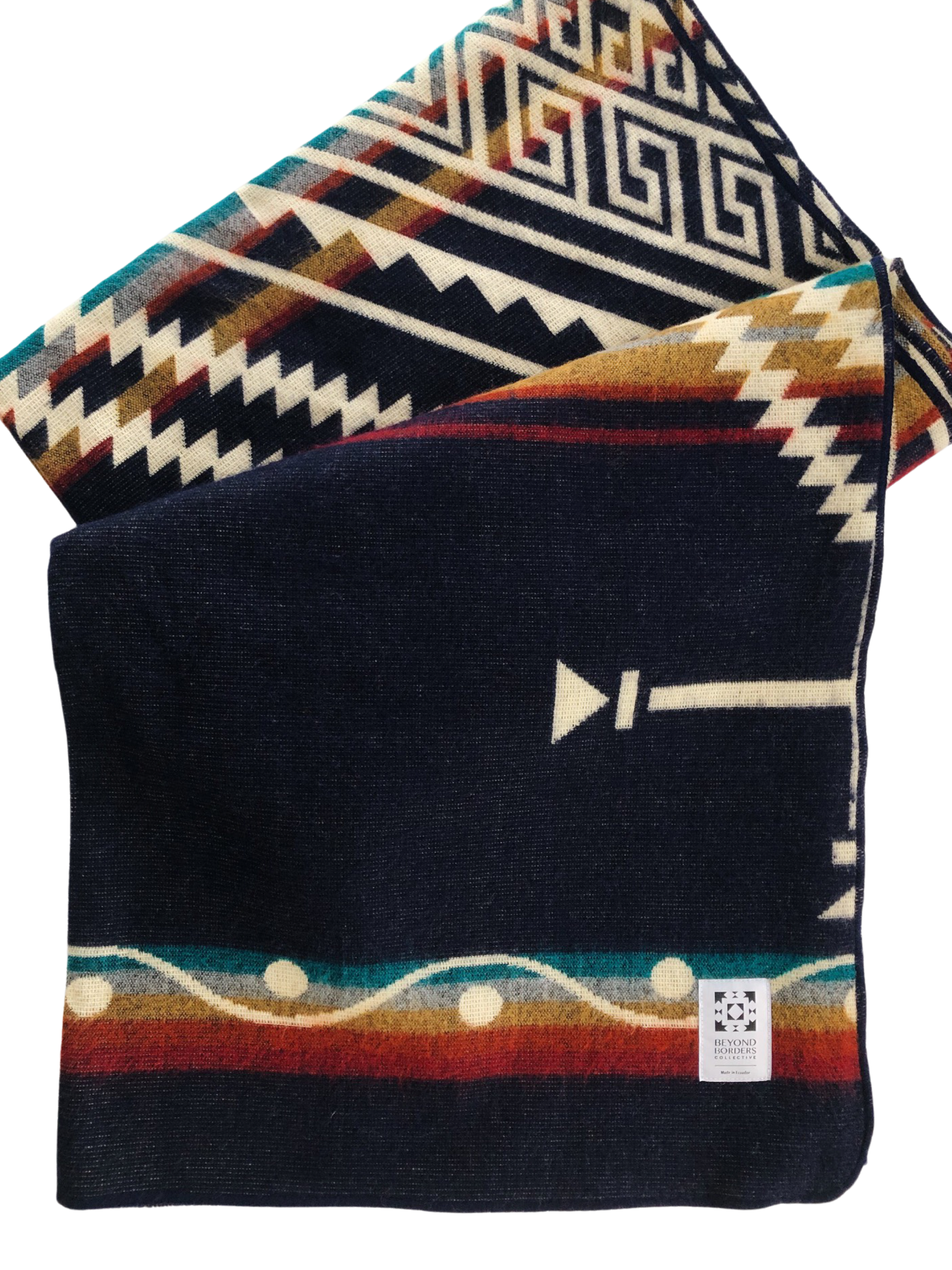 Achuar Blanket in Dark Navy, handcrafted from recycled acrylic, showcasing reversible colors and a cozy design, perfect for indoor and outdoor use.