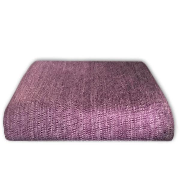 Cozy alpaca bed blanket in various colors, showcasing its soft texture and luxurious feel.