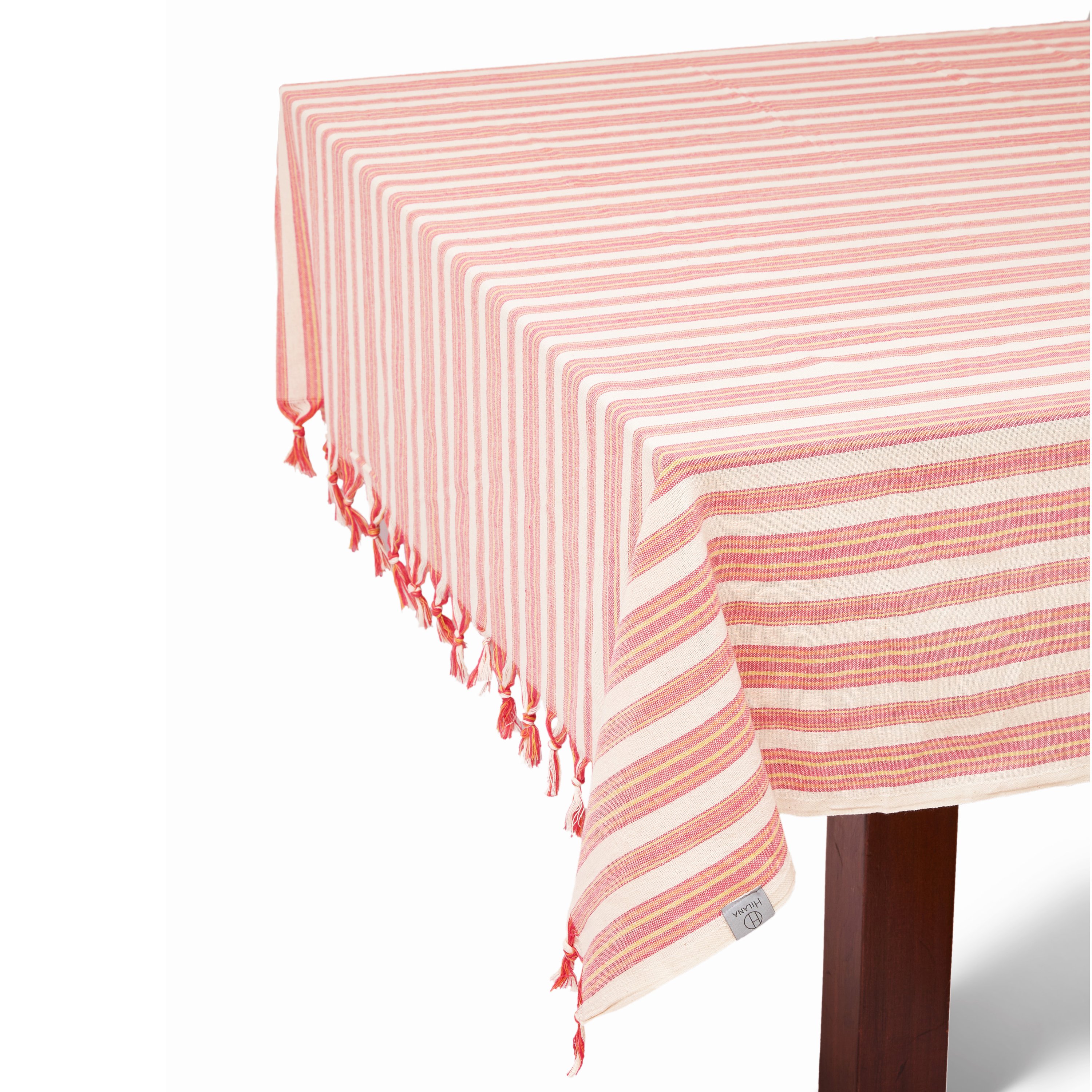 Andana Striped Tablecloth Set in Magenta with matching napkins, showcasing eco-friendly design and stylish stripes.