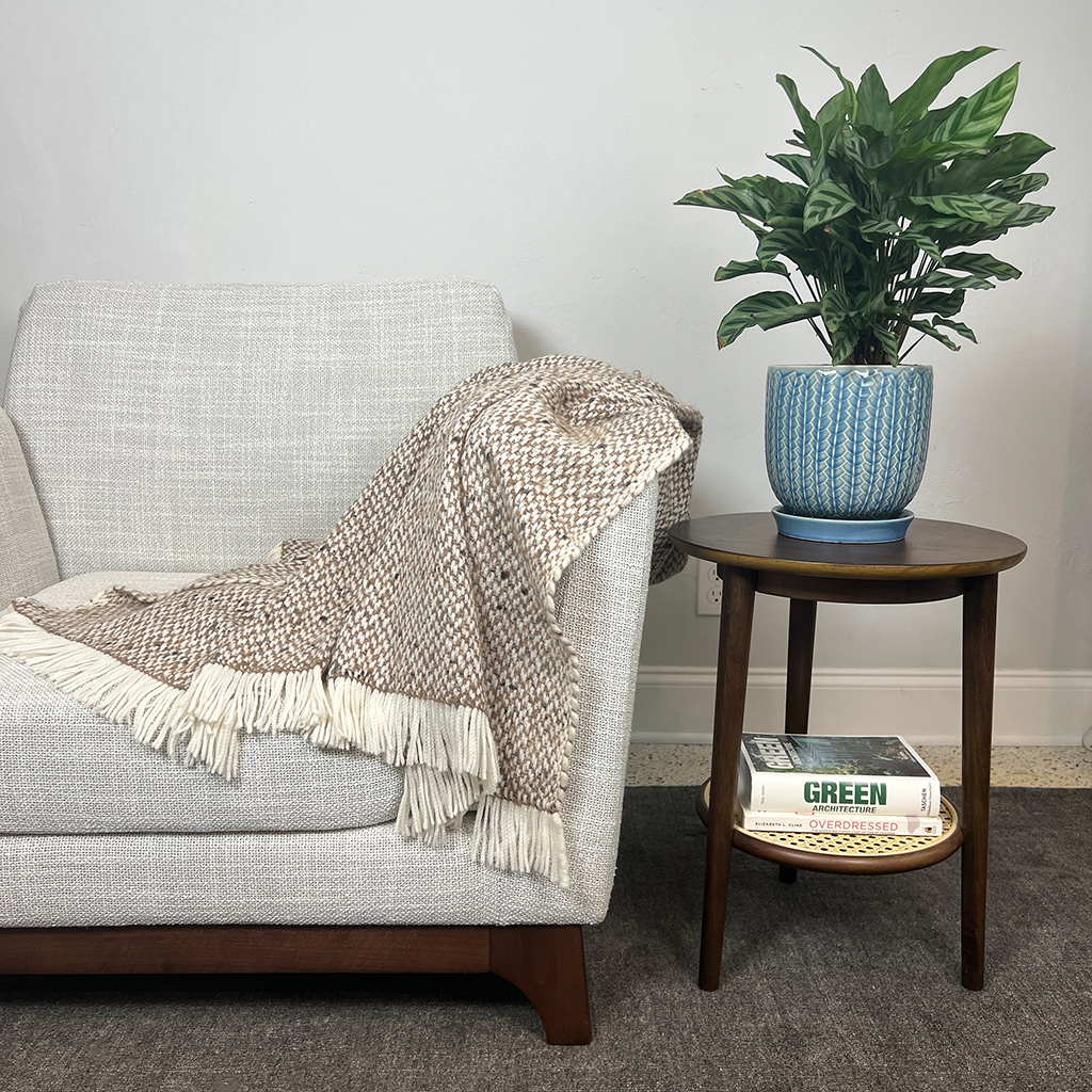 Chunky Camel Weave Alpaca Throw showcasing soft texture and neutral colors, perfect for home decor.