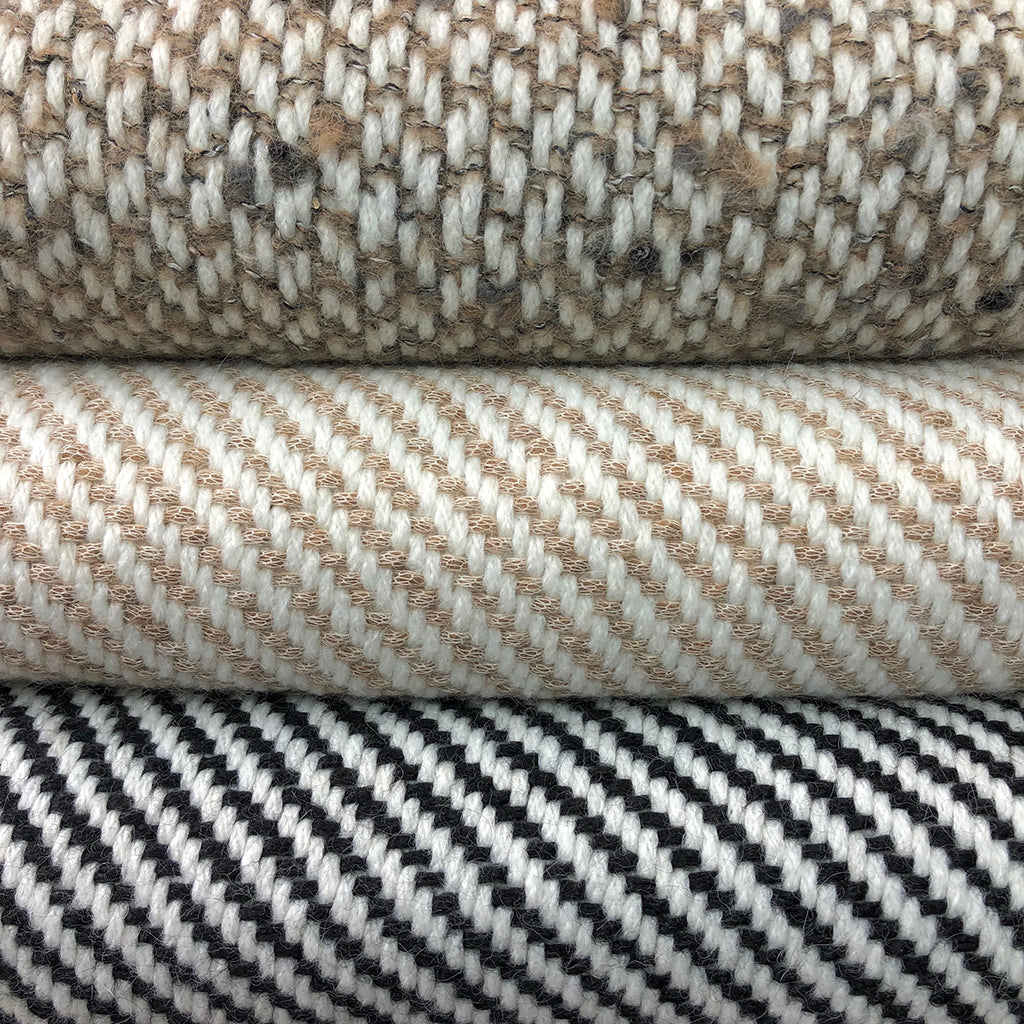 Chunky Camel Weave Alpaca Throw showcasing soft texture and neutral colors, perfect for home decor.