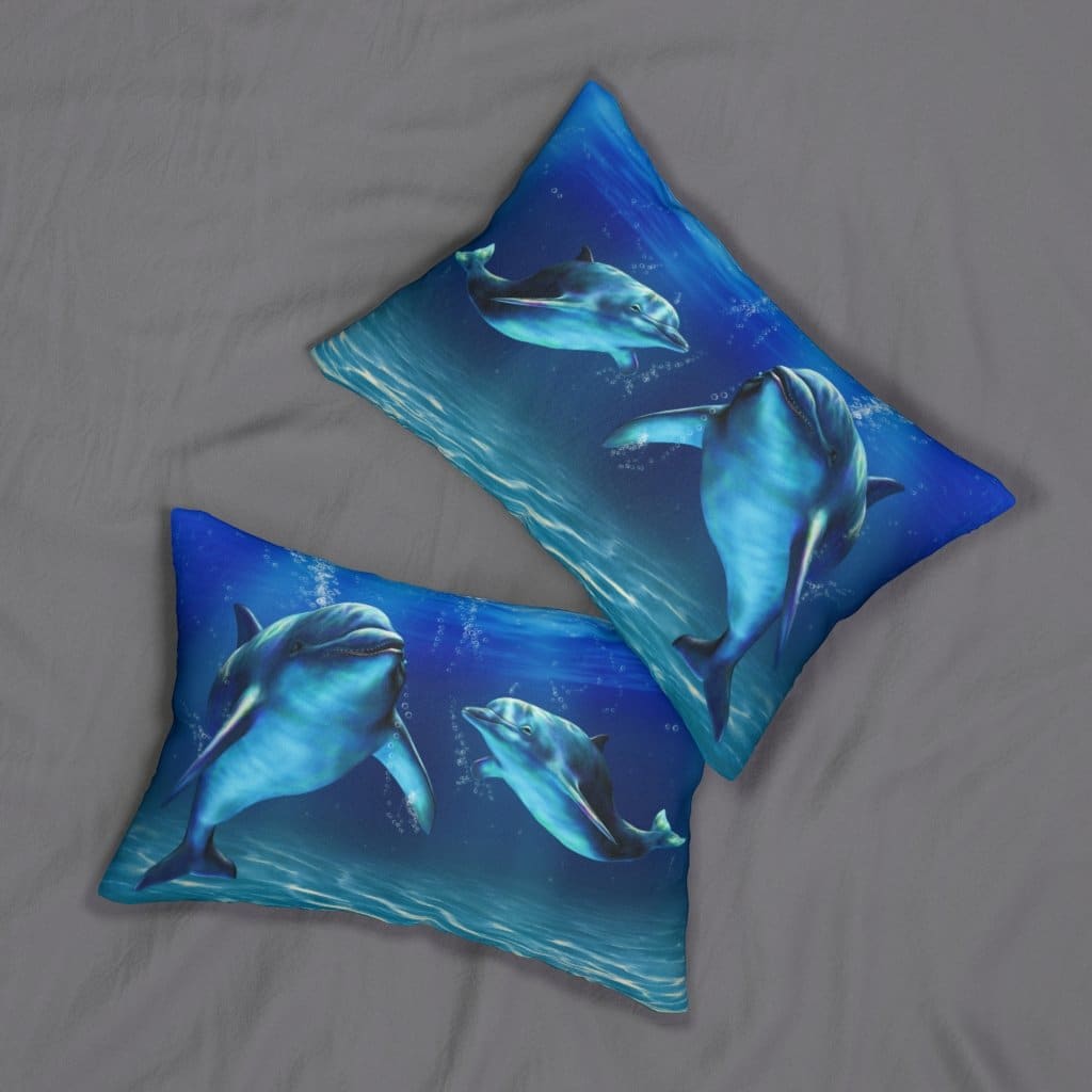 Decorative lumbar throw pillow featuring a blue dolphin design, made from spun-polyester fabric with a hidden zipper.