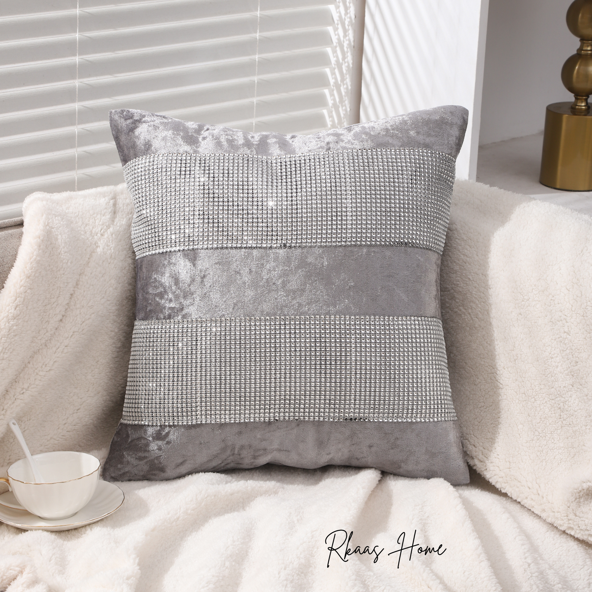 Diamante Sparkle Silver Grey Crushed Ice Velvet Square Cushion Covers displayed elegantly on a sofa, showcasing their luxurious texture and stylish design.