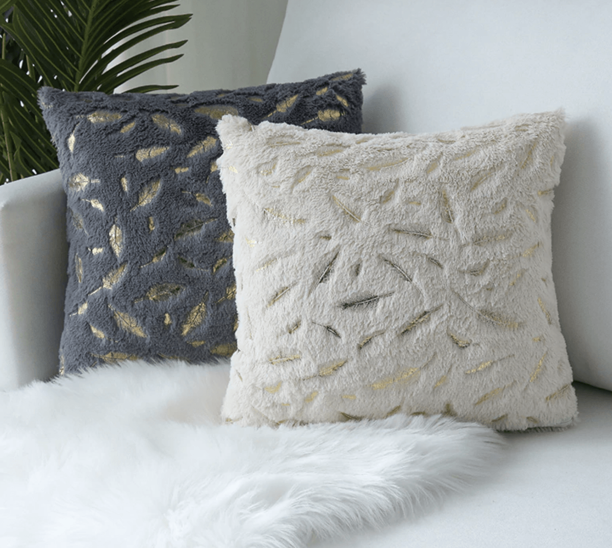 Dixie Plush pillows featuring soft velvet fabric and hand-painted gold decals, perfect for home decor.