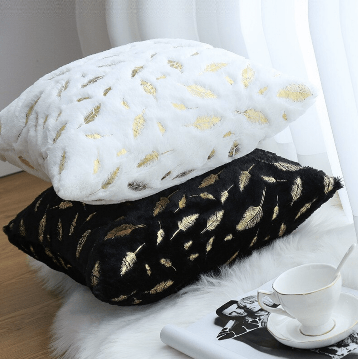 Dixie Plush pillows featuring soft velvet fabric and hand-painted gold decals, perfect for home decor.