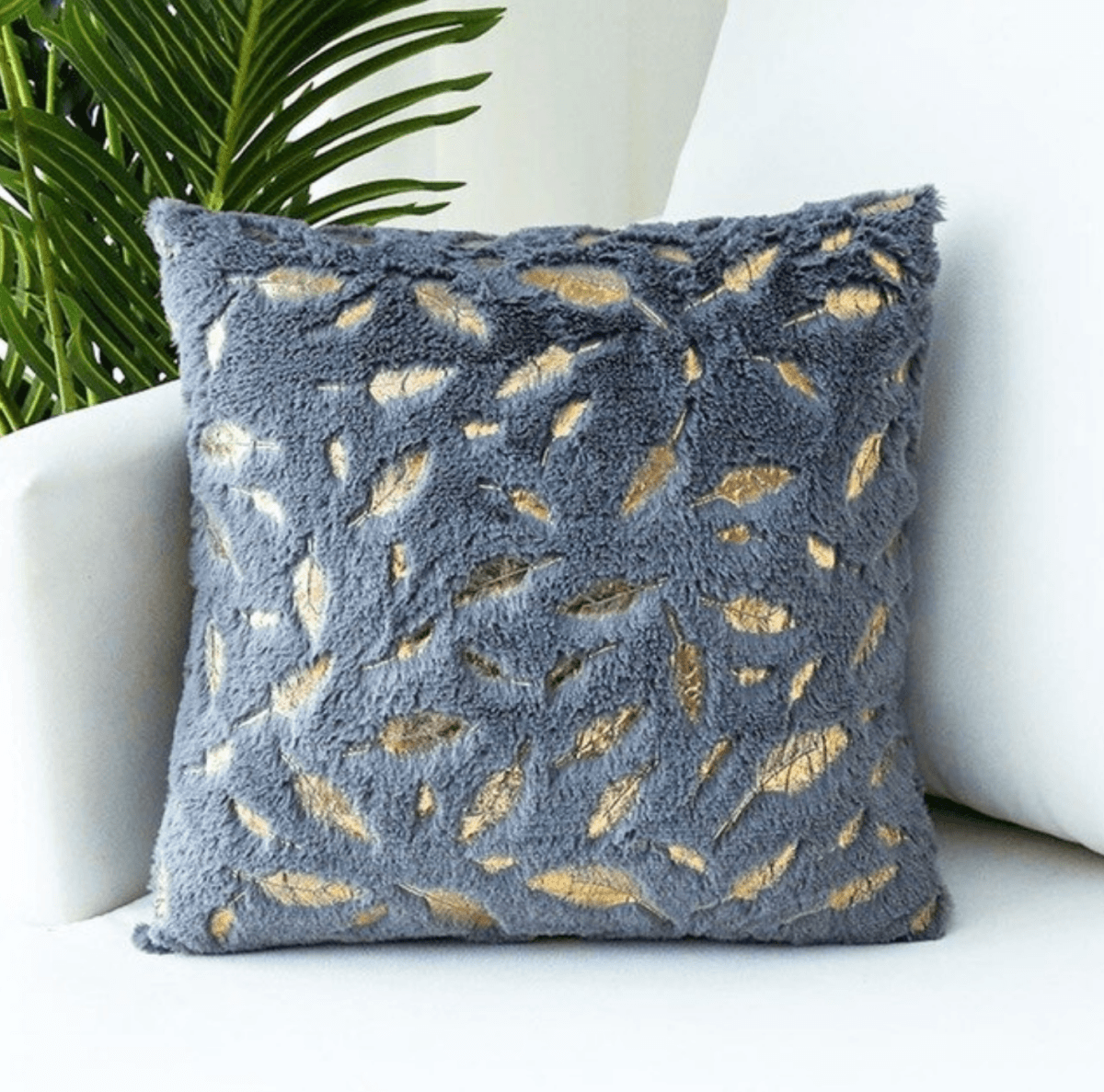 Dixie Plush pillows featuring soft velvet fabric and hand-painted gold decals, perfect for home decor.