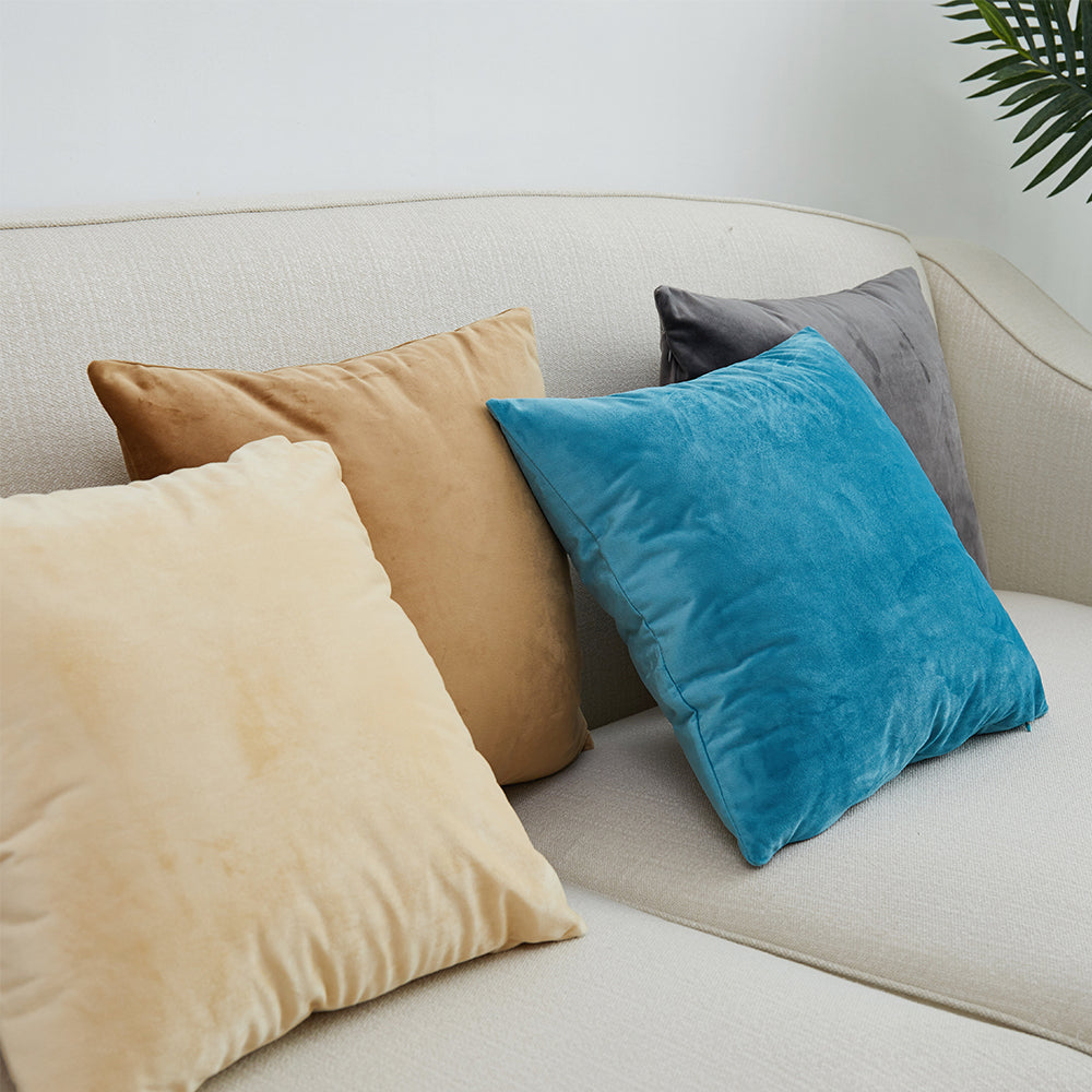 A collection of Dutch Velvet Cushion Covers in various colors, showcasing their luxurious texture and solid pattern, perfect for home decor.