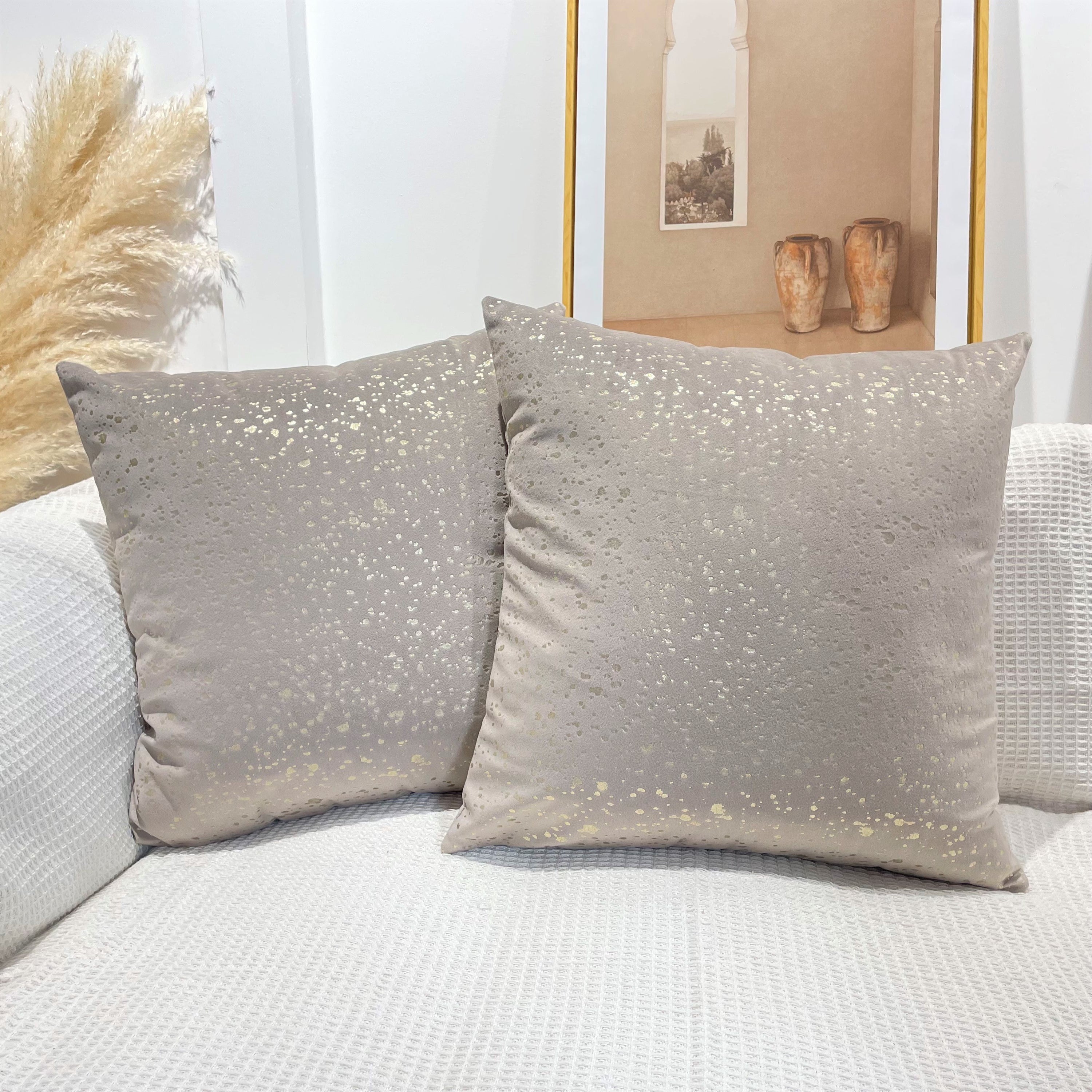 Gold Stamp Dots Velvet Cushion Covers in a stylish living room setting, showcasing their luxurious texture and elegant design.