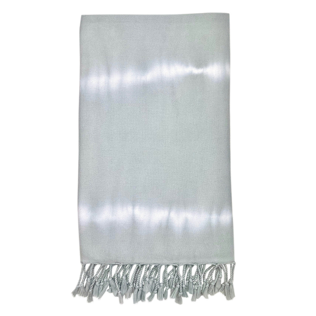 Gray Tie Dye Turkish Beach Towel made from 100% Turkish cotton, showcasing unique patterns and tassels, perfect for beach or bath use.