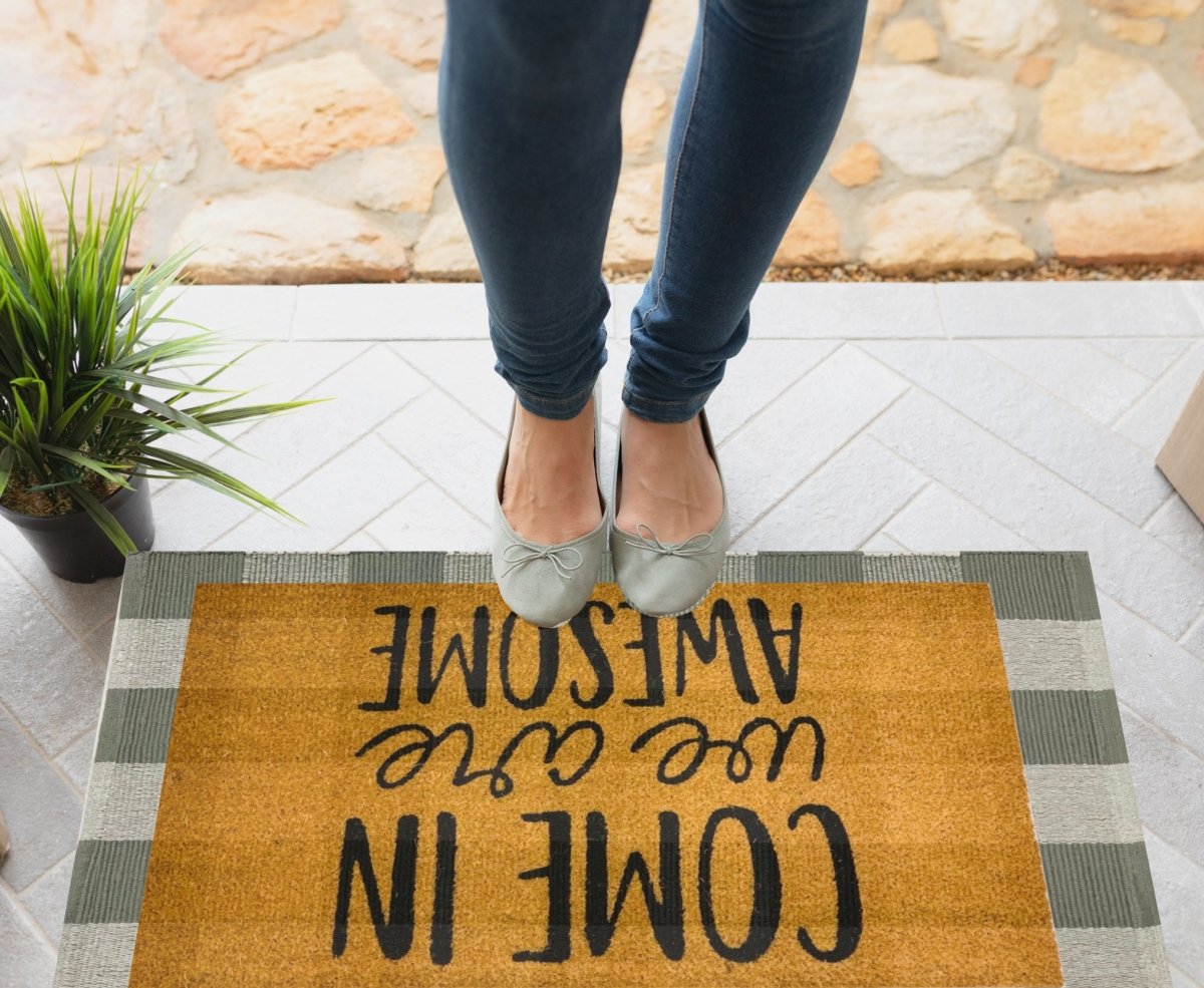 Gray's Base Mat featuring a red buffalo check design, perfect for layering with quote mats, made of 100% woven cotton.