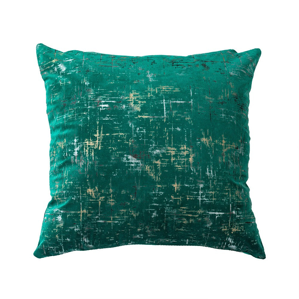 Green velvet cushion cover with gold geometric stamping, perfect for home decor.