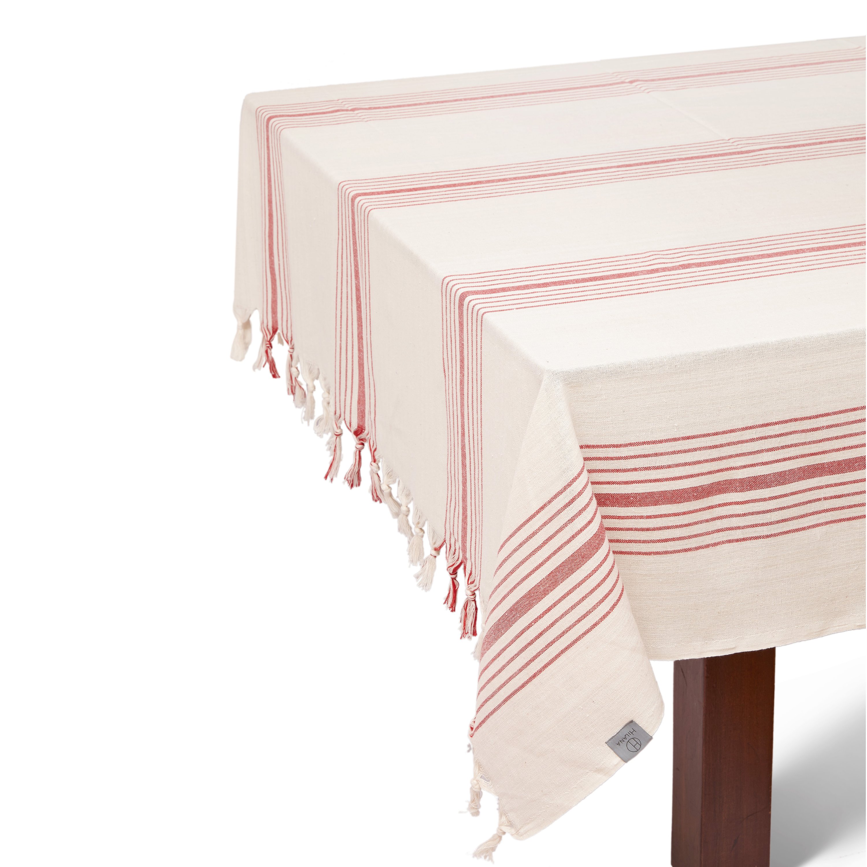 Kayseri Tablecloth Set in Red featuring a Mediterranean design with hand-tied tassels and woven French stripes, perfect for elegant dining.