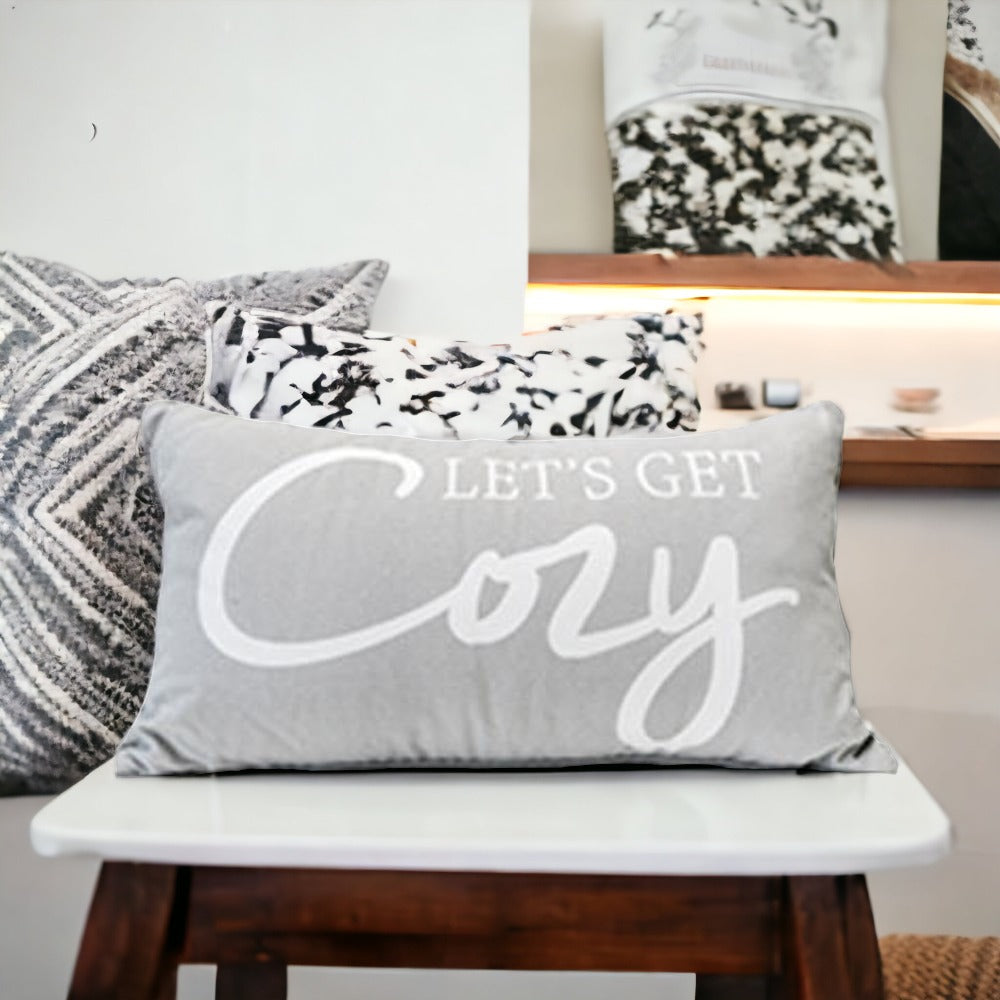 Let's Get Cozy LG reversible throw pillow featuring cozy text on one side and a checkered gray pattern on the other, perfect for home decor.