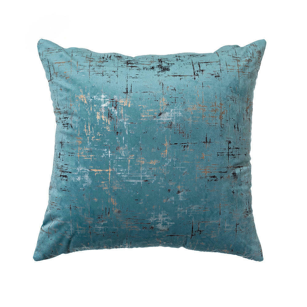 Light blue velvet cushion cover with gold geometric stamping, showcasing a luxurious design suitable for various home decor styles.