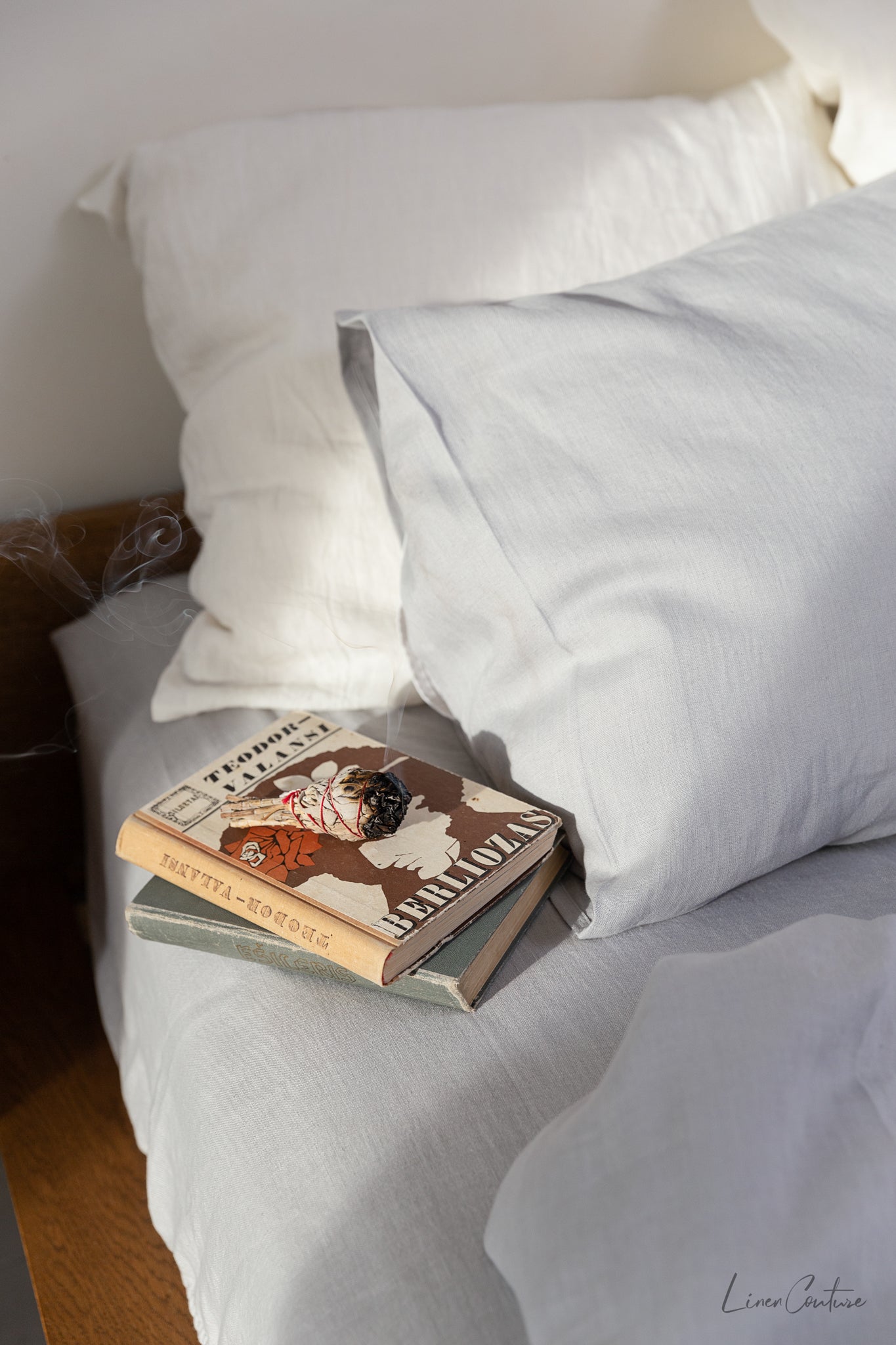 Elegant linen pillow cases with envelope closure, showcasing soft texture and natural fabric in various colors.