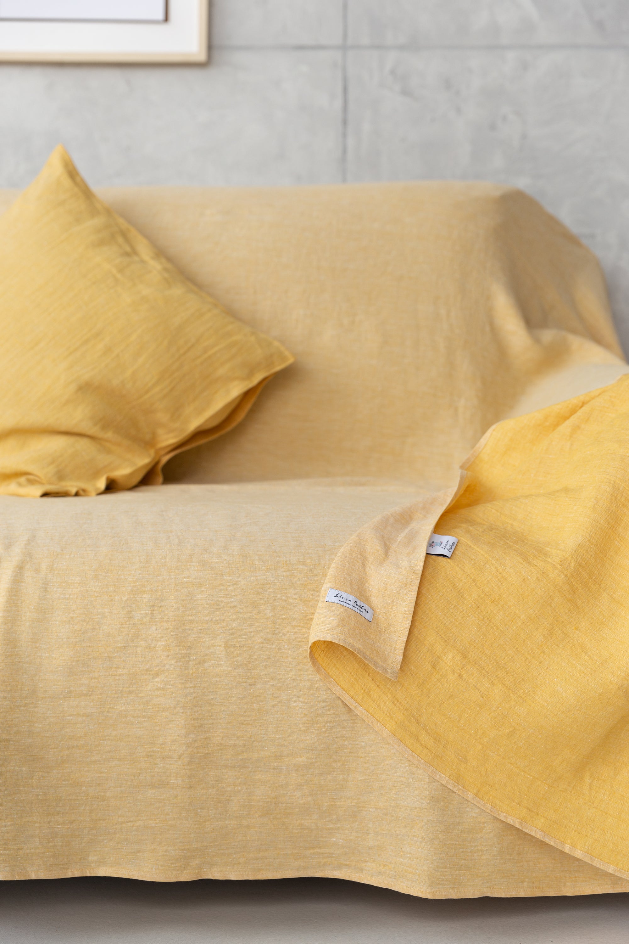 Elegant linen pillow cases with envelope closure, showcasing soft texture and natural fabric in various colors.